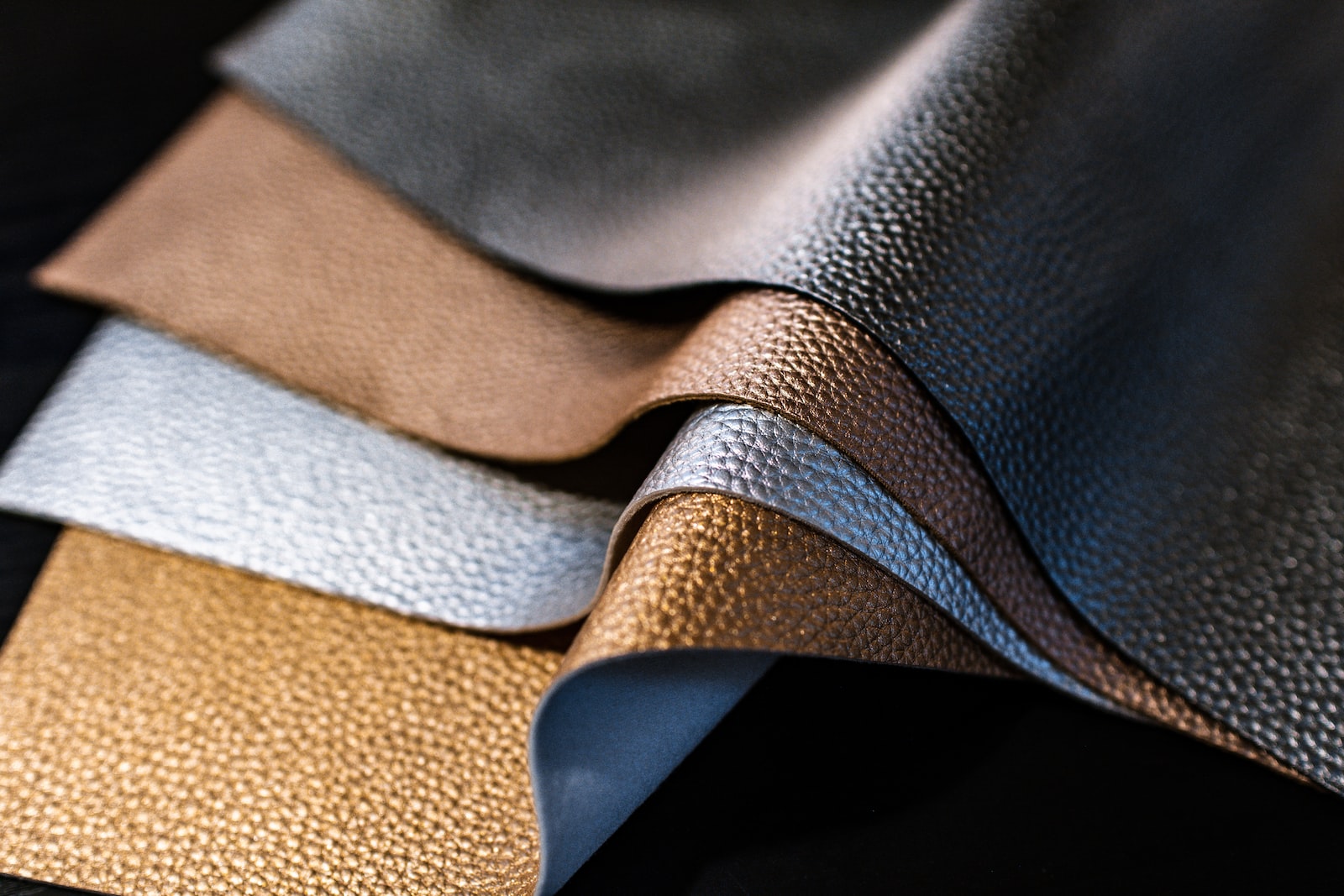 selective-focus of photography of assorted color of leather